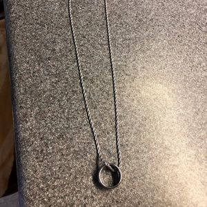 Tungsten carbide ring on stainless steel chain.